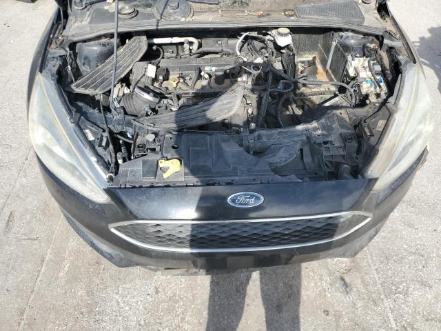 Photo 11 from auction – 2017 FORD FOCUS SE with VIN 1FADP3F20HL219371