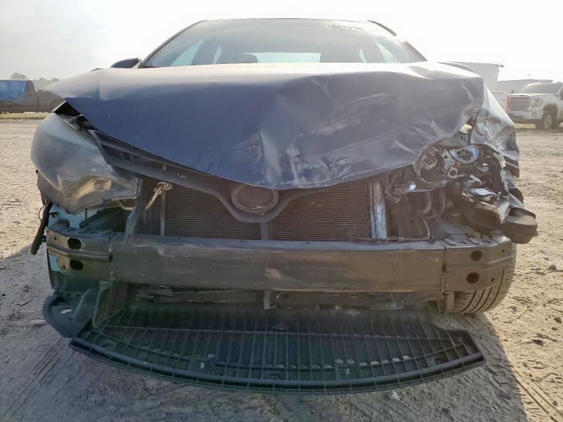 Photo 5 from auction – 2014 TOYOTA COROLLA L with VIN 5YFBURHE6EP173584