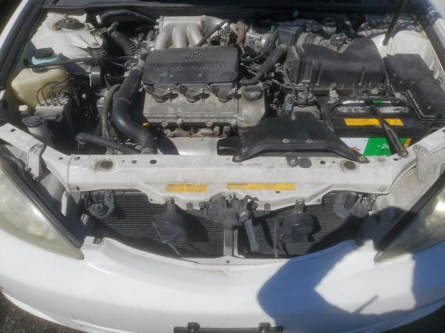 Photo 11 from auction – 2003 TOYOTA CAMRY LE with VIN JTDBF30K530110864