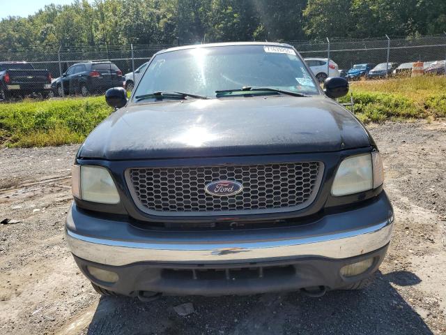 Zdjęcie 5 z aukcji – 2002 FORD F150 z VIN 1FTRX18L52KC75040