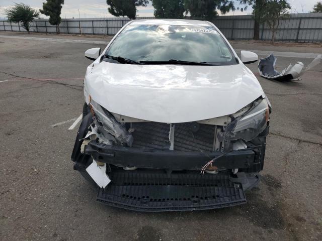 Photo 5 from auction – 2019 TOYOTA COROLLA L with VIN 2T1BURHE3KC236880