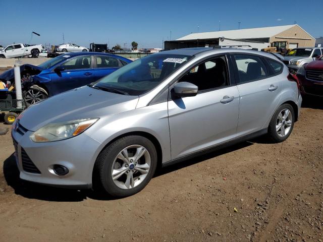 FORD FOCUS SE 2014 with VIN 1FADP3K21EL265518 - Photo from auction