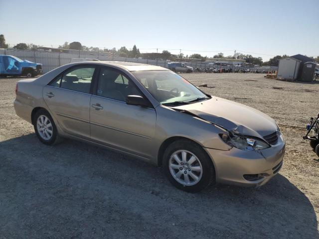 Photo 4 from auction – 2002 TOYOTA CAMRY LE with VIN JTDBF30K120086139