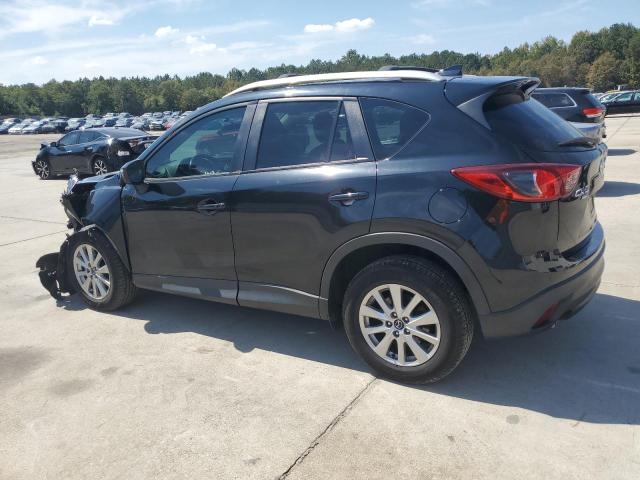 Photo 2 from auction – 2016 MAZDA CX-5 TOURING with VIN JM3KE4CY6G0790683