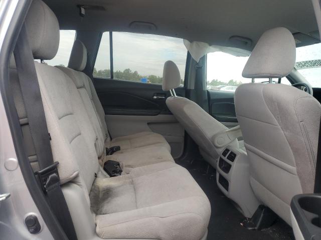 Photo 11 from auction – 2020 HONDA PILOT LX with VIN 5FNYF5H15LB025705