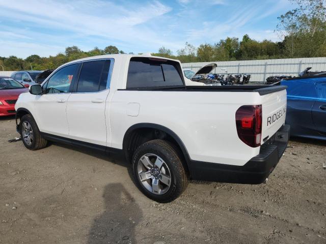 Photo 2 from auction – 2025 HONDA RIDGELINE with VIN 5FPYK3F57SB032490