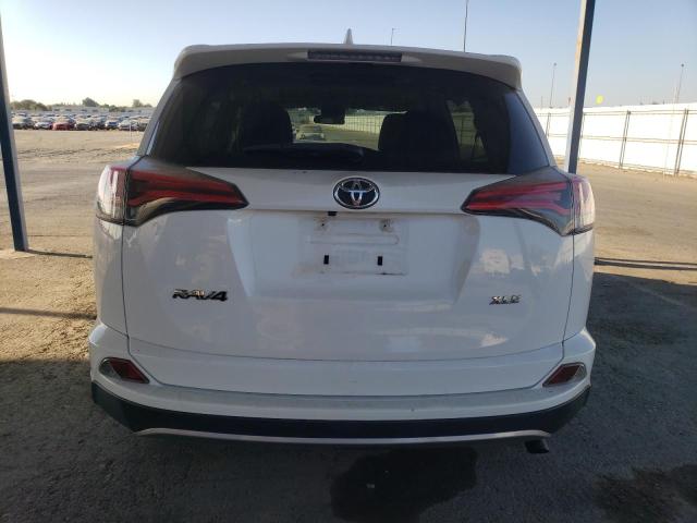 Photo 6 from auction – 2017 TOYOTA RAV4 XLE with VIN JTMWFREV6HD106815