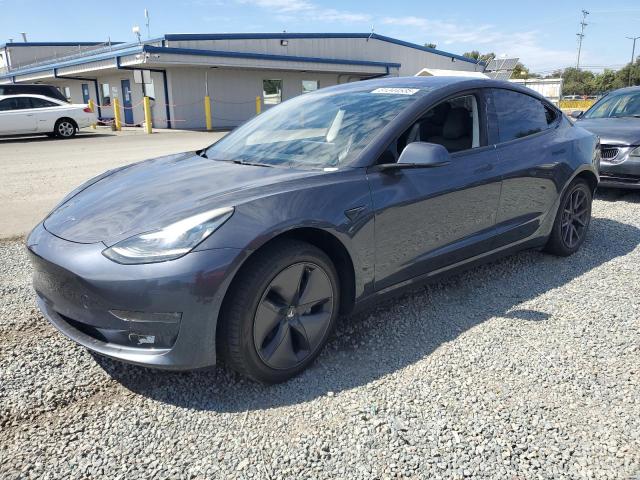 TESLA MODEL 3 2018 with VIN 5YJ3E1EA5JF018972 - Photo from auction