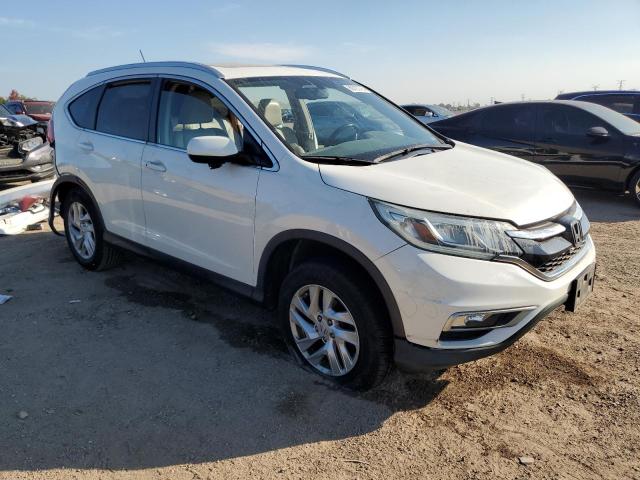 Photo 4 from auction – 2015 HONDA CR-V EXL with VIN 5J6RM4H79FL132471