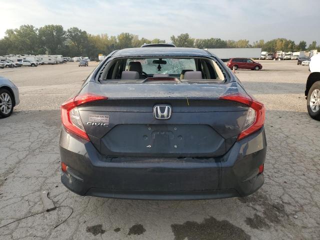 Photo 6 from auction – 2018 HONDA CIVIC LX with VIN 2HGFC2F50JH597908