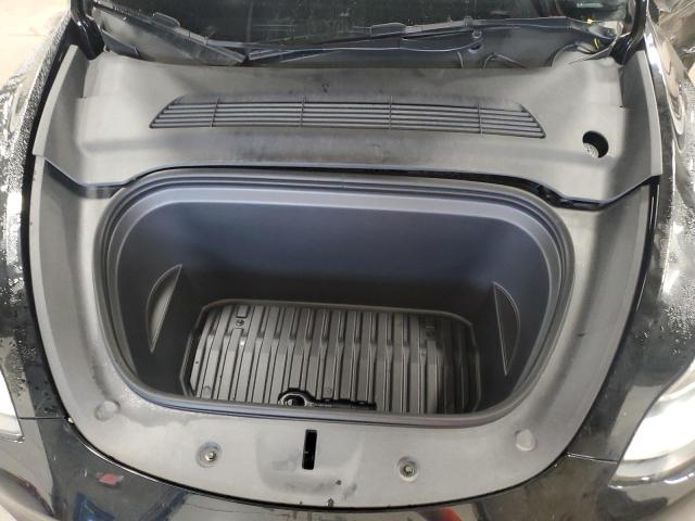 Photo 11 from auction – 2023 TESLA MODEL Y with VIN 7SAYGDEE8PA157118