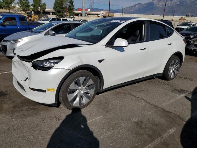 TESLA MODEL Y 2022 with VIN 7SAYGAEE1NF344196 - Photo from auction