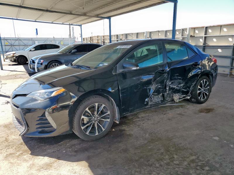 TOYOTA COROLLA L 2019 with VIN 2T1BURHE1KC205952 - Photo from auction