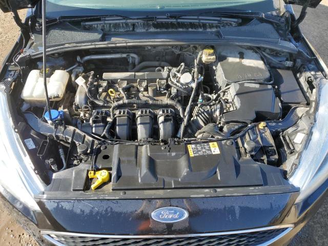 Photo 11 from auction – 2017 FORD FOCUS SE with VIN 1FADP3F24HL255760
