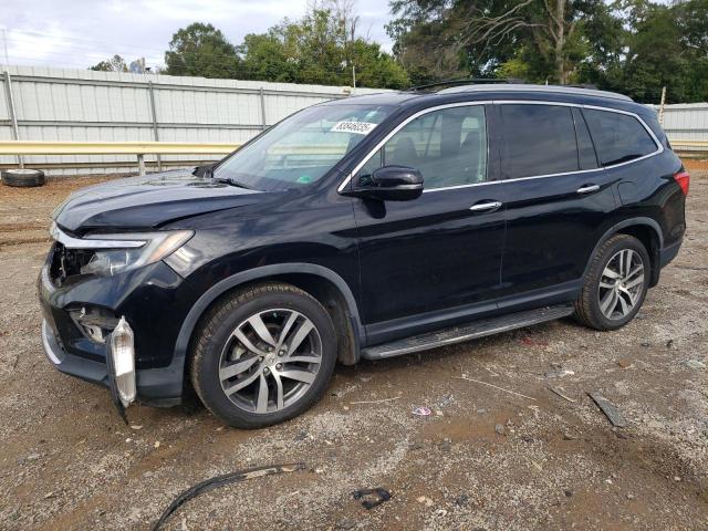 HONDA PILOT ELIT 2016 с VIN 5FNYF6H01GB126338 - Фото с аукциона