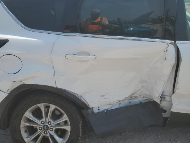 Photo 11 from auction – 2017 FORD ESCAPE SE with VIN 1FMCU9GDXHUB25411