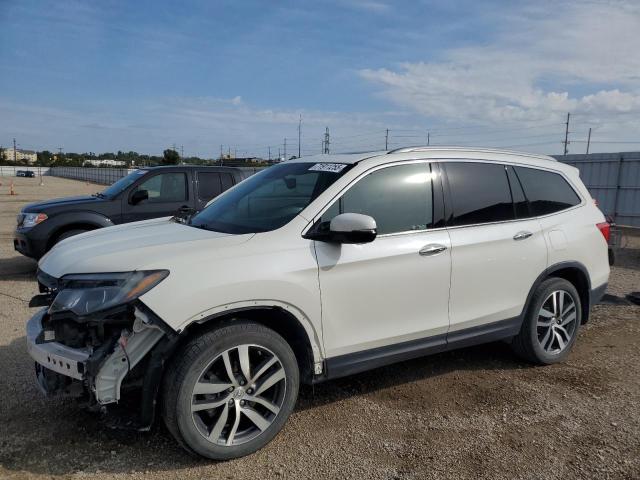 HONDA PILOT TOURING 2017 with VIN 5FNYF6H94HB095974 - Photo from auction