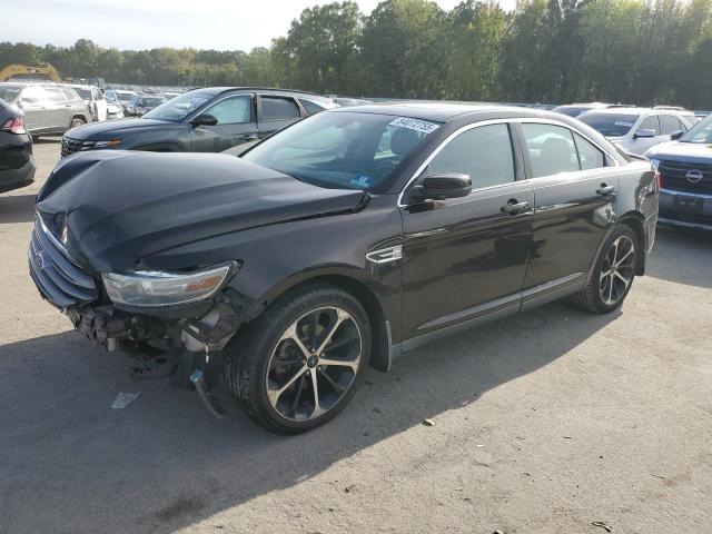 FORD TAURUS SEL 2014 with VIN 1FAHP2E81EG116529 - Photo from auction