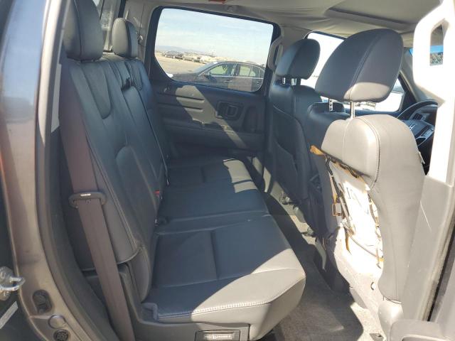 Photo 10 from auction – 2010 HONDA RIDGELINE with VIN 5FPYK1F53AB006519