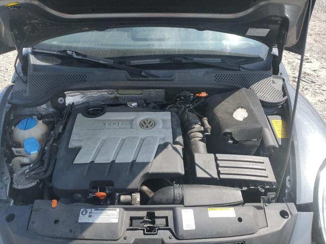 Photo 12 from auction – 2013 VOLKSWAGEN BEETLE with VIN 3VW5L7AT2DM831742