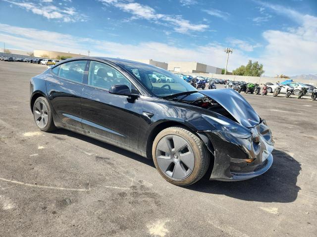 Photo 4 from auction – 2021 TESLA MODEL 3 with VIN 5YJ3E1EAXMF875714