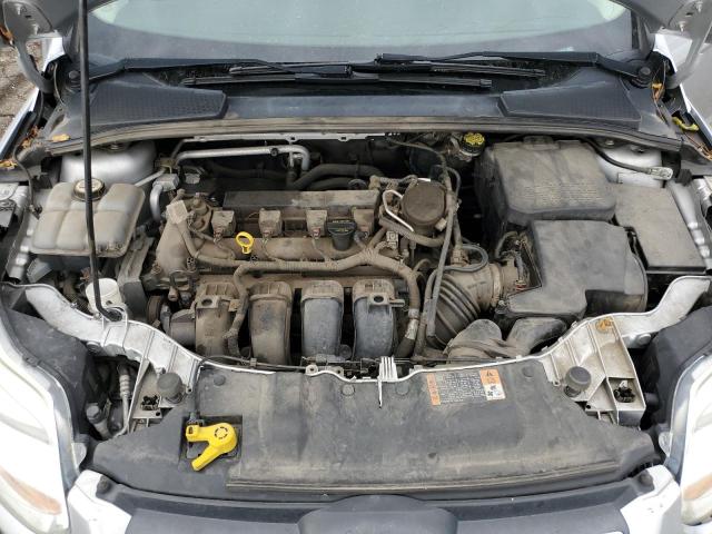 Photo 11 from auction – 2014 FORD FOCUS SE with VIN 1FADP3F24EL299818