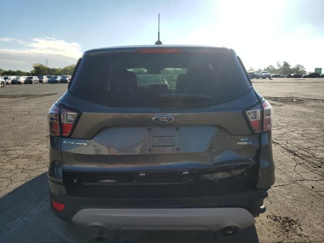 Photo 6 from auction – 2017 FORD ESCAPE SE with VIN 1FMCU9GD6HUC98357