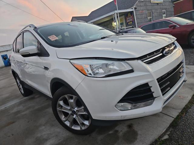 FORD ESCAPE TIT 2014 with VIN 1FMCU9J93EUB52059 - Photo from auction
