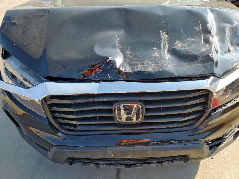 Photo 11 from auction – 2023 HONDA RIDGELINE with VIN 5FPYK3F58PB037415