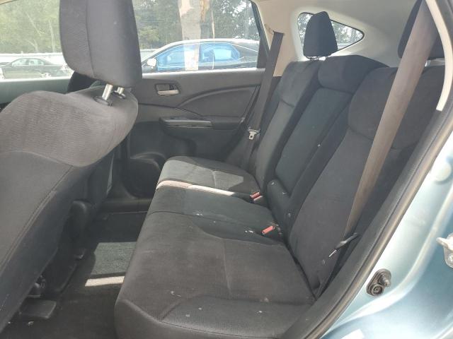 Photo 11 from auction – 2014 HONDA CR-V with VIN 2HKRM4H34EH725371