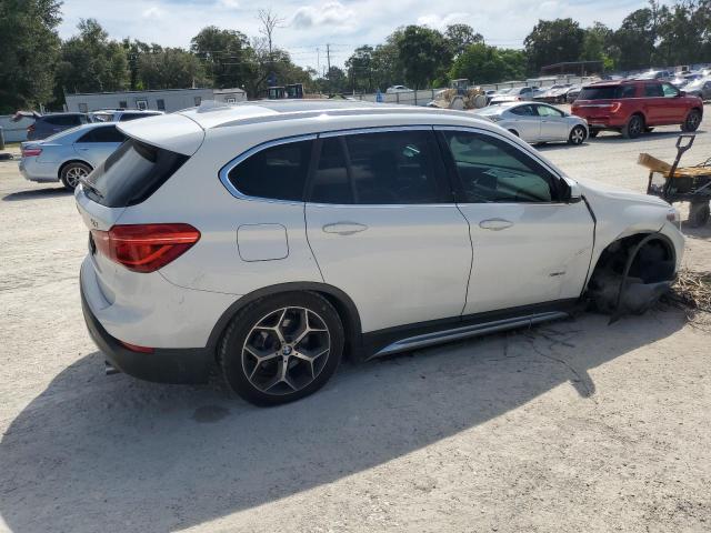 Photo 3 from auction – 2016 BMW X1 XDRIVE2 with VIN WBXHT3C36G5E51714