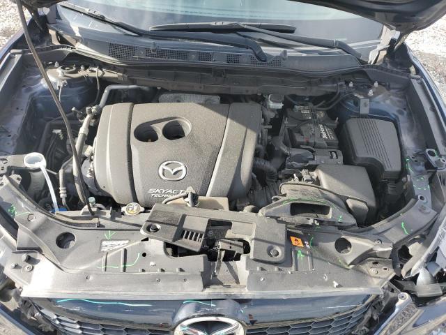 Photo 11 from auction – 2015 MAZDA CX-5 GT with VIN JM3KE2DY1F0517085