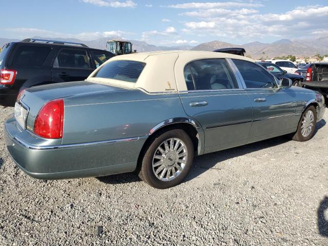 Photo 3 from auction – 2004 LINCOLN TOWN CAR E with VIN 1LNHM81W64Y657042