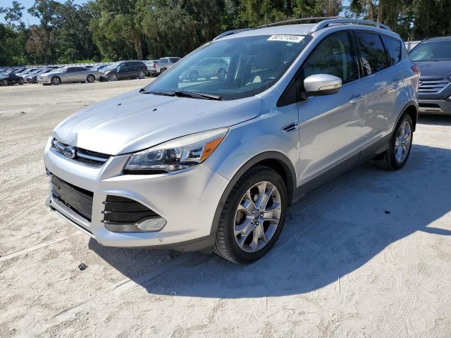 FORD ESCAPE TITANIUM 2014 with VIN 1FMCU0JX4EUD63491 - Photo from auction