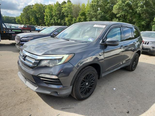 HONDA PILOT EXL 2016 with VIN 5FNYF6H57GB045470 - Photo from auction