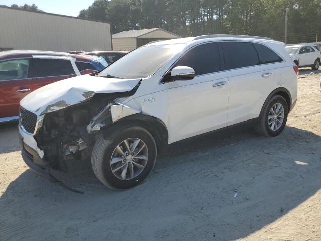 KIA SORENTO LX 2016 with VIN 5XYPG4A34GG180985 - Photo from auction