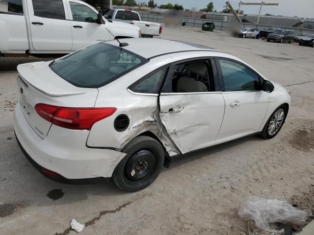 Photo 3 from auction – 2017 FORD FOCUS TITANIUM with VIN 1FADP3J23HL264716