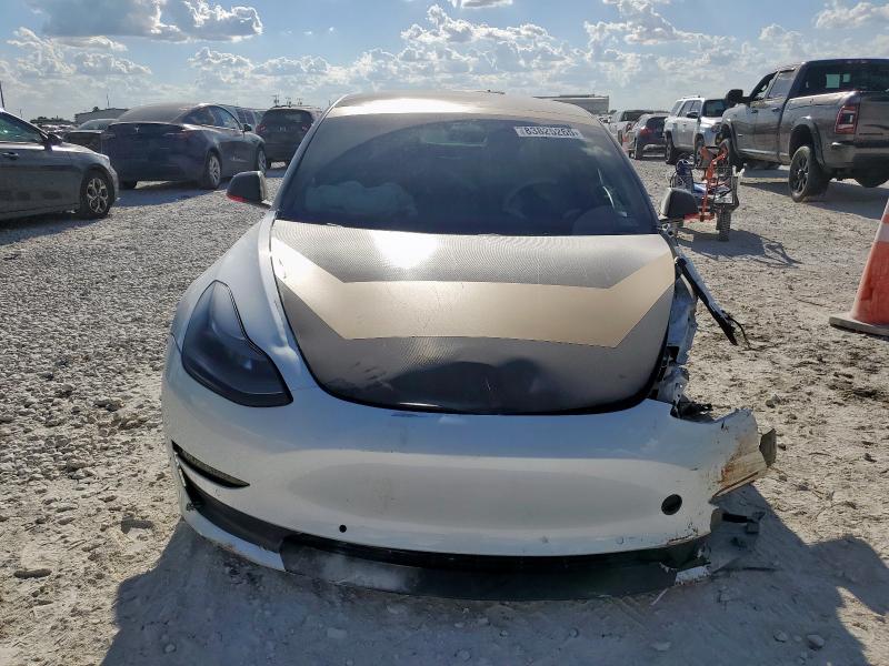 Photo 5 from auction – 2022 TESLA MODEL 3 with VIN 5YJ3E1EB6NF250284