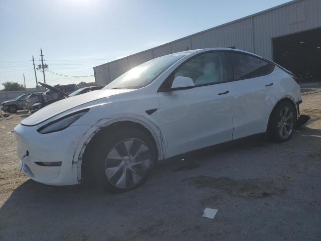 TESLA MODEL Y 2023 with VIN 7SAYGAEE8PF660164 - Photo from auction