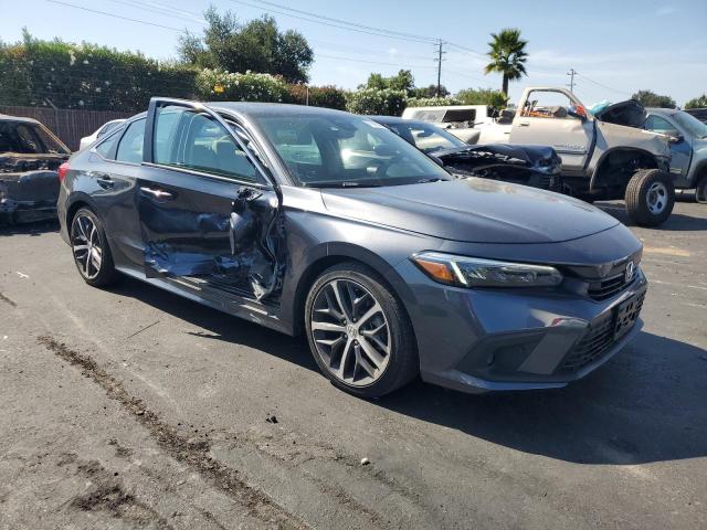 Photo 4 from auction – 2024 HONDA CIVIC TOURING with VIN 2HGFE1F93RH303548