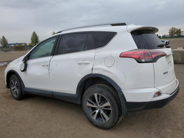 Photo 2 from auction – 2018 TOYOTA RAV4 LE with VIN 2T3BFREV2JW729176