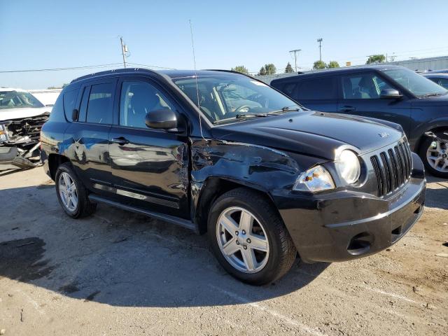 Photo 4 from auction – 2010 JEEP COMPASS SP with VIN 1J4NF4FB0AD502144