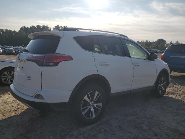 Photo 3 from auction – 2017 TOYOTA RAV4 XLE with VIN JTMRFREV6HD210749