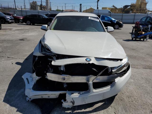 Photo 5 from auction – 2016 BMW 320 I with VIN WBA8A9C59GK617288