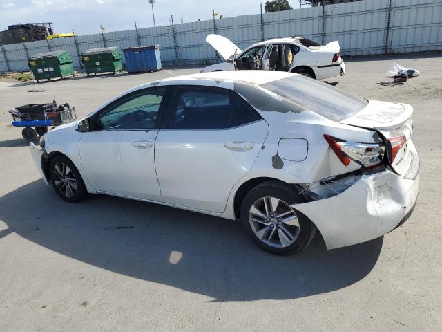 Photo 2 from auction – 2014 TOYOTA COROLLA EC with VIN 5YFBPRHE6EP037429