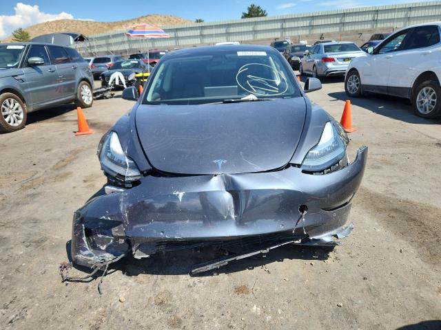 Photo 5 from auction – 2022 TESLA MODEL 3 with VIN 5YJ3E1EB9NF243569