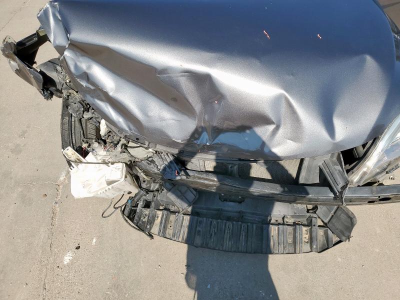 Photo 11 from auction – 2015 NISSAN SENTRA S with VIN 3N1AB7AP3FL631407