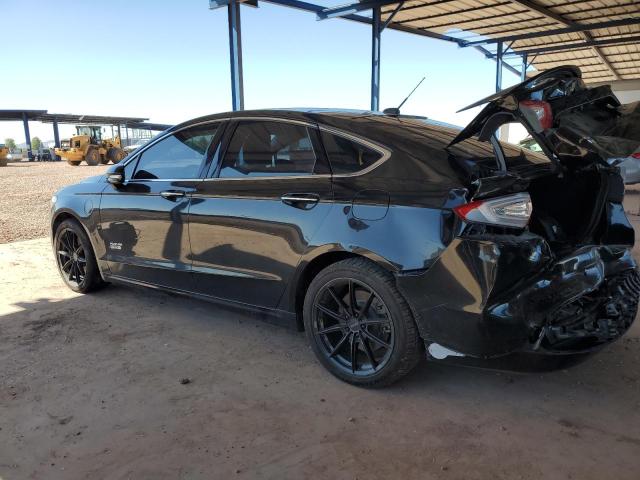 Photo 2 from auction – 2014 FORD FUSION TITANIUM PHEV with VIN 3FA6P0SUXER269299