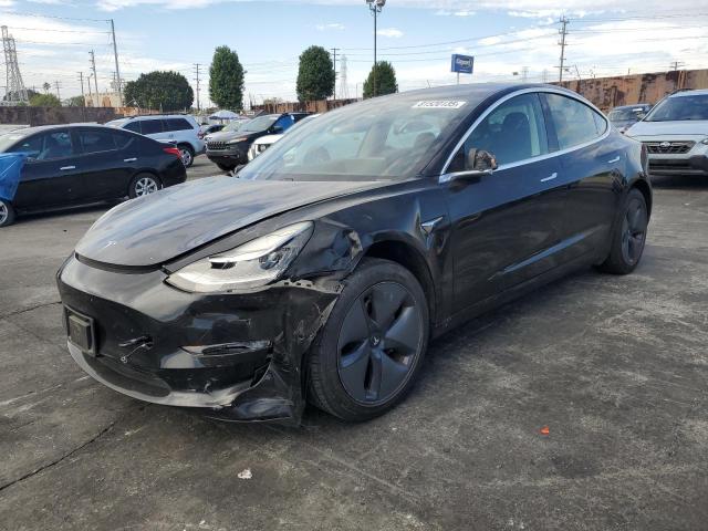 TESLA MODEL 3 2020 with VIN 5YJ3E1EA0LF704565 - Photo from auction