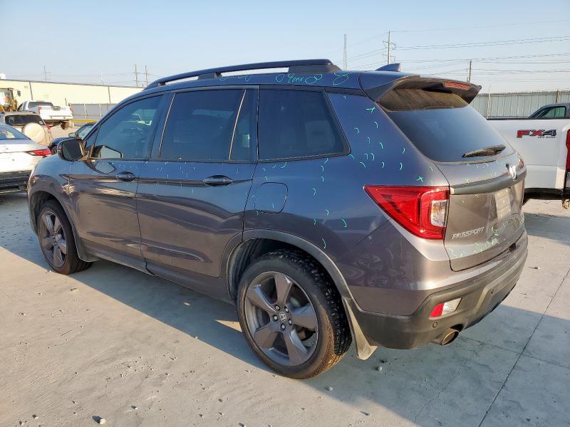 Photo 2 from auction – 2021 HONDA PASSPORT with VIN 5FNYF7H97MB011906